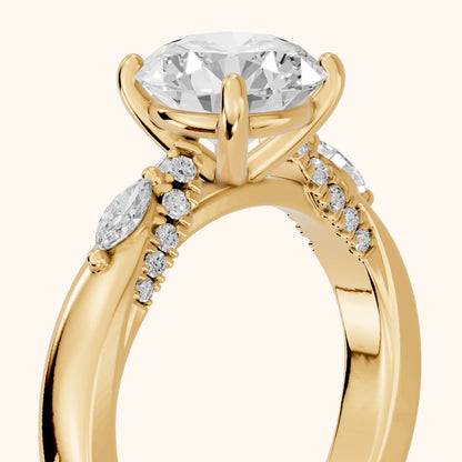 Tahoe Marquise-Side Pavé Round Diamond Engagement Ring in Yellow Gold - slant-view.webp