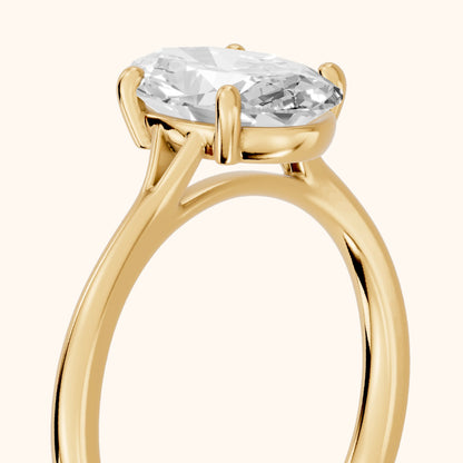 Blanche Solitaire Split Shank Oval Diamond Engagement Ring in Yellow Gold - slant-view.webp