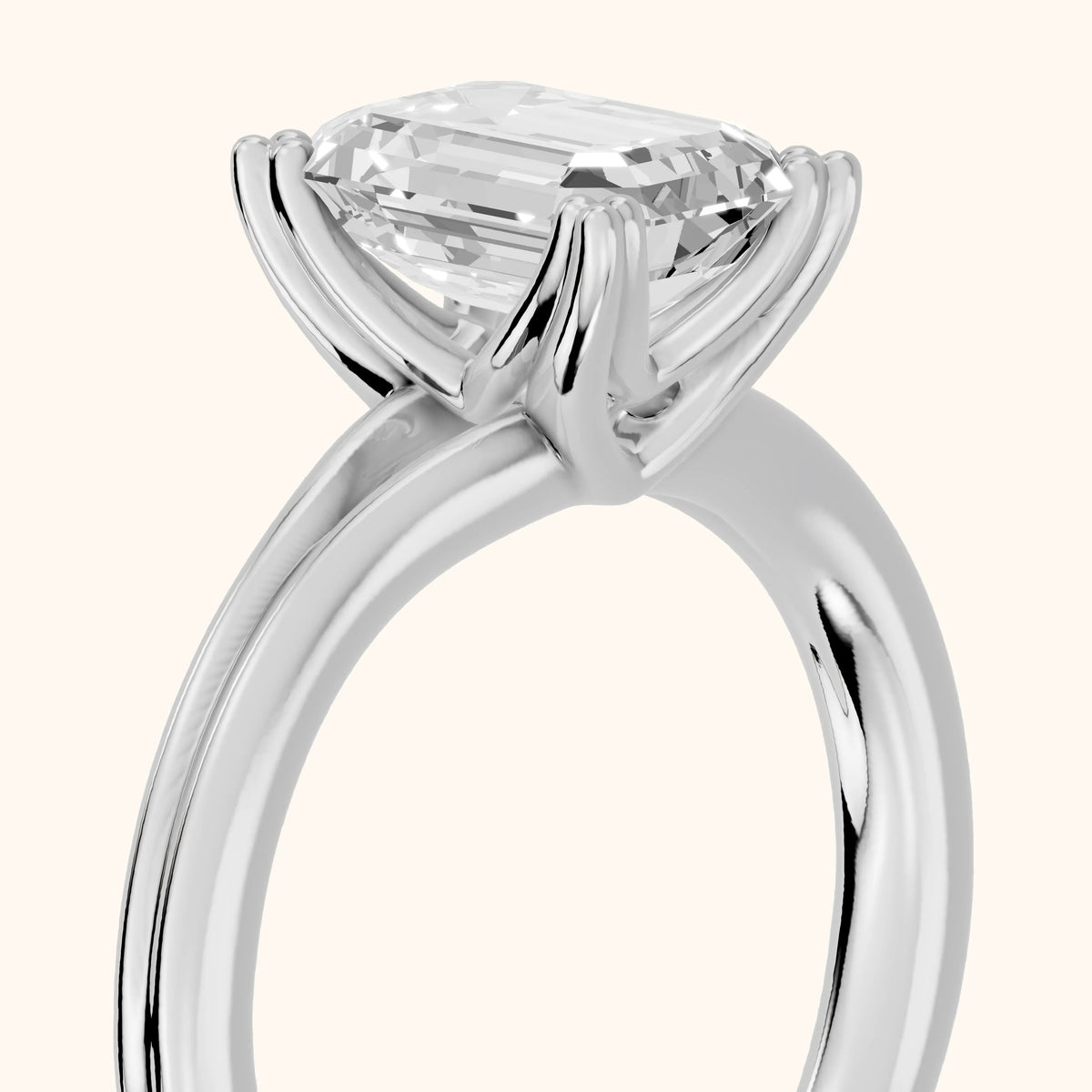 Neve Solitaire Split Shank Emerald Diamond Engagement Ring in Silver - slant-view.webp