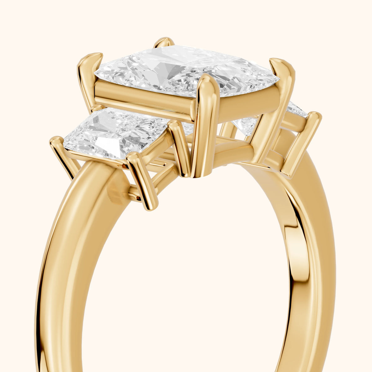 Zoe Three-Stone Radiant Diamond Engagement Ring in Yellow Gold - slant-view.webp