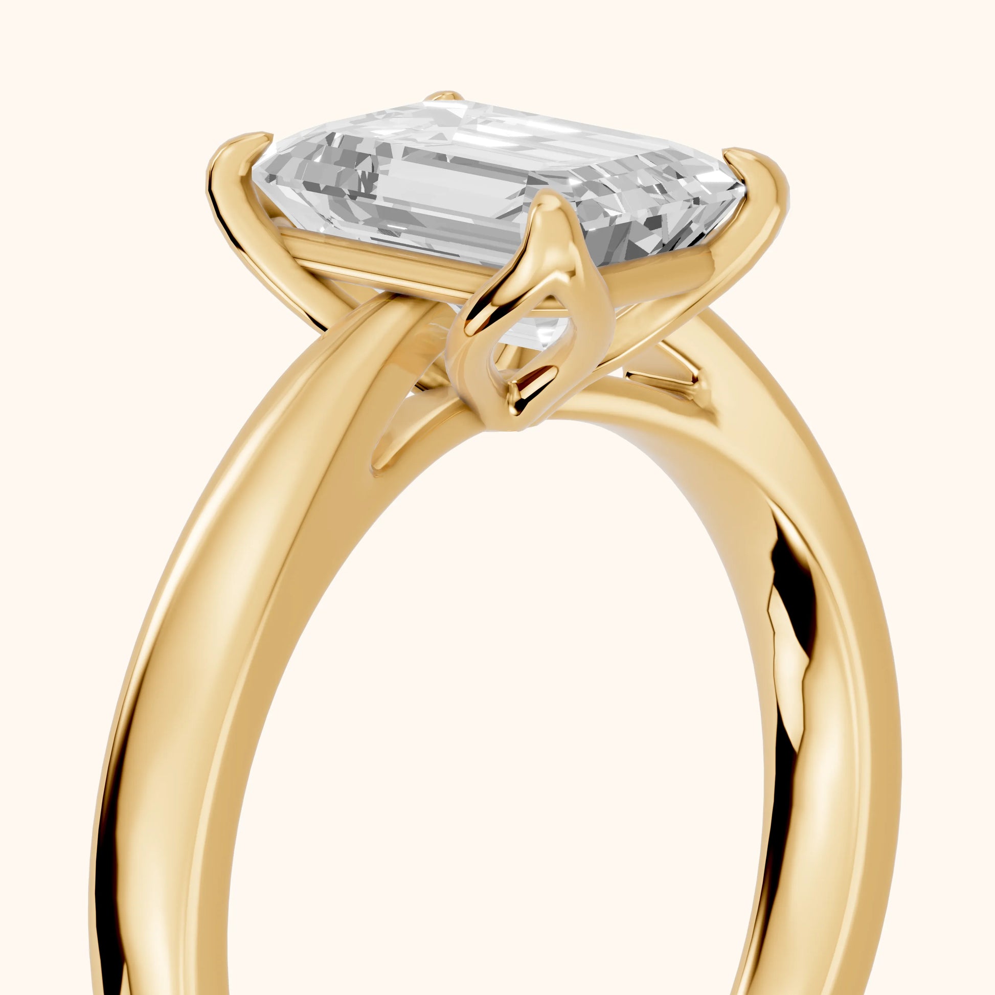 Lucia Solitaire Six-Prong Emerald Diamond Engagement Ring in Yellow Gold - slant-view.webp
