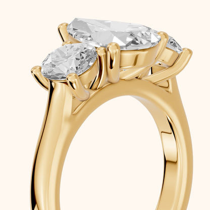 Callie Three-Stone Trellis Pear Diamond Engagement Ring in Yellow Gold - slant-view.webp