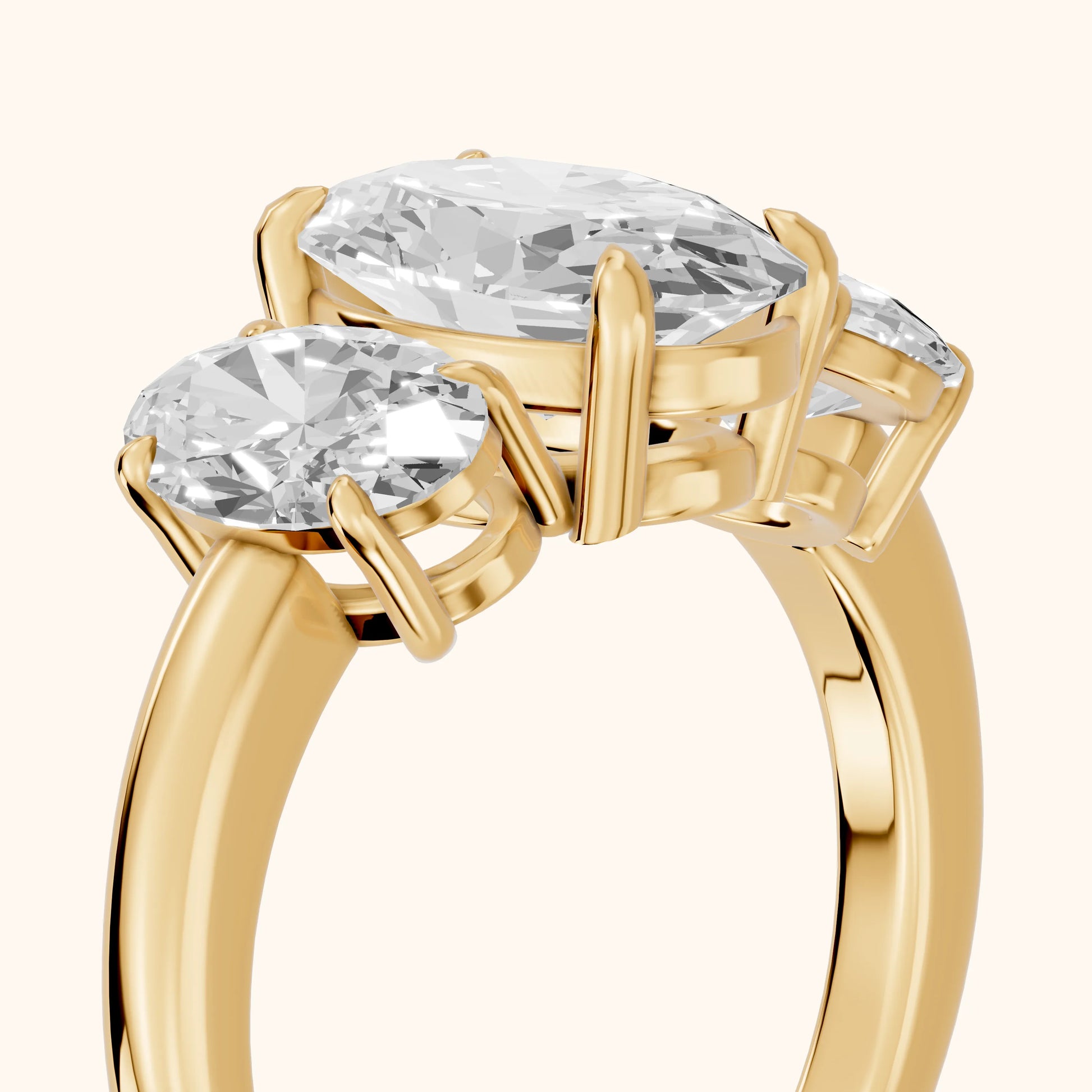 Lila Three-Stone Oval Diamond Ring in Yellow Gold - slant-view.webp