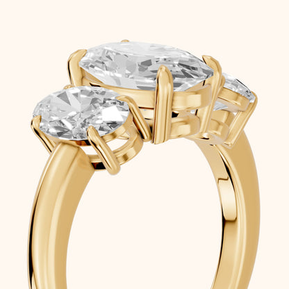 Lila Three-Stone Oval Diamond Ring in Yellow Gold - slant-view.webp