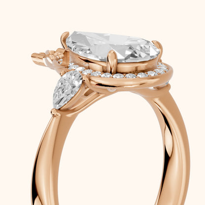 Eliza Halo Sidestone Pear Diamond Engagement Ring in Rose Gold - slant-view.webp