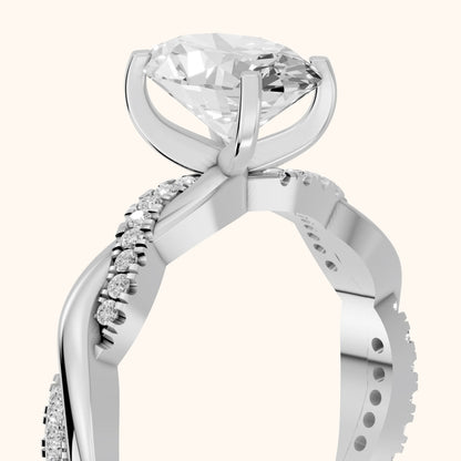 Twisted Side Stone Oval Diamond Engagement Ring in Silver - slant-view.webp