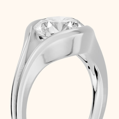 Windsor Half Bezel Solitaire Round Diamond Engagement Ring in Platinum - slant-view.webp