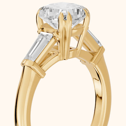 Betsy Baguette Three-Stone Cushion Diamond Engagement Ring in Yellow Gold - slant-view.webp