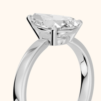 Delia Solitaire Pear Diamond Engagement Ring in Silver - slant-view.webp
