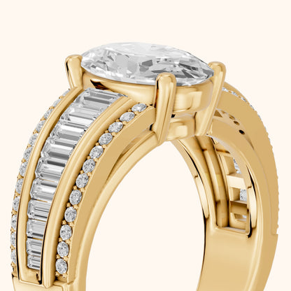 Halle Channel Set Baguette Accent Oval Diamond Engagement Ring in Yellow Gold - slant-view.webp