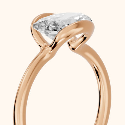 Mathilde East-West Half Bezel Oval Diamond Engagement Ring in Rose Gold - slant-view.webp