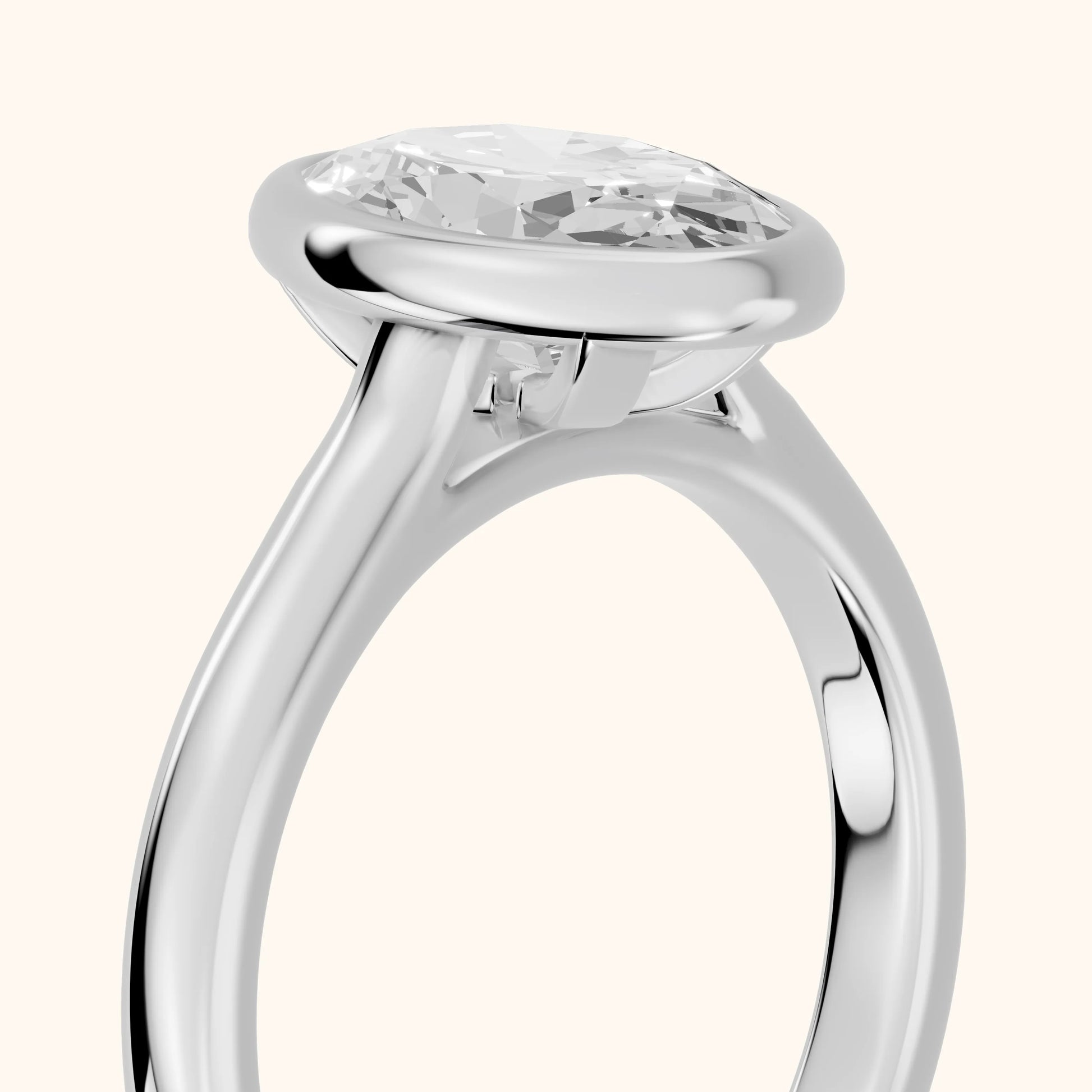 Jolie Bezel Solitaire Oval Diamond Engagement Ring in White Gold - slant-view.webp