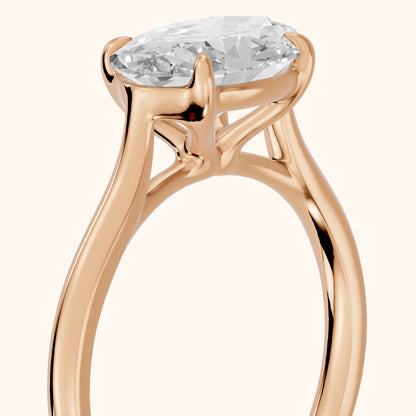 Ally East-West Solitaire Oval Diamond Engagement Ring in Rose Gold - slant-view.webp