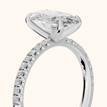 Ione Solitaire Pavé Oval Diamond Engagement Ring in Platinum - slant-view.webp