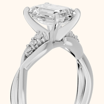Stefania Twist Emerald Diamond Engagement Ring in Platinum - slant-view.webp