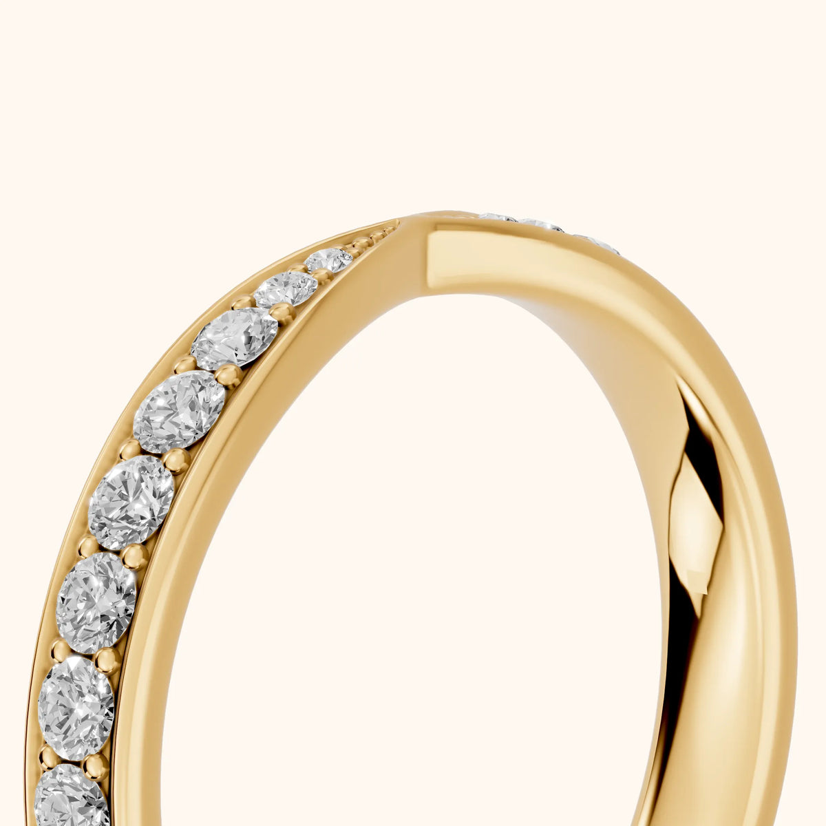 Clara Tapered Riviera Round Diamond Eternity Band in Yellow Gold - slant-view