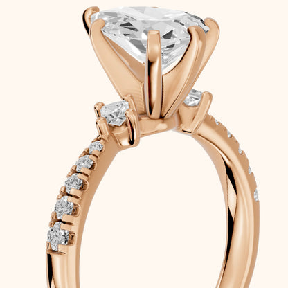 Alethea Three-Stone Pavé Pear Diamond Engagement Ring in Rose Gold - slant-view.webp