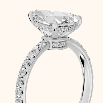 Thea Hidden Halo Pavé Pear Diamond Engagement Ring in Platinum - slant-view.webp