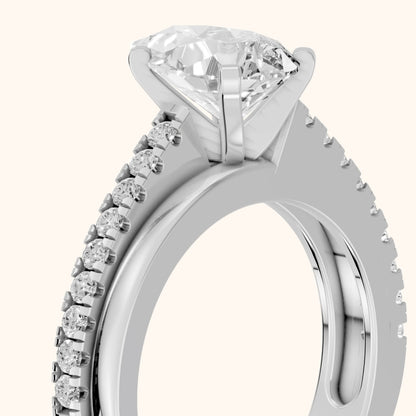 Edith Criss Cross Pavé Pear Diamond Engagement Ring in Platinum - slant-view.webp