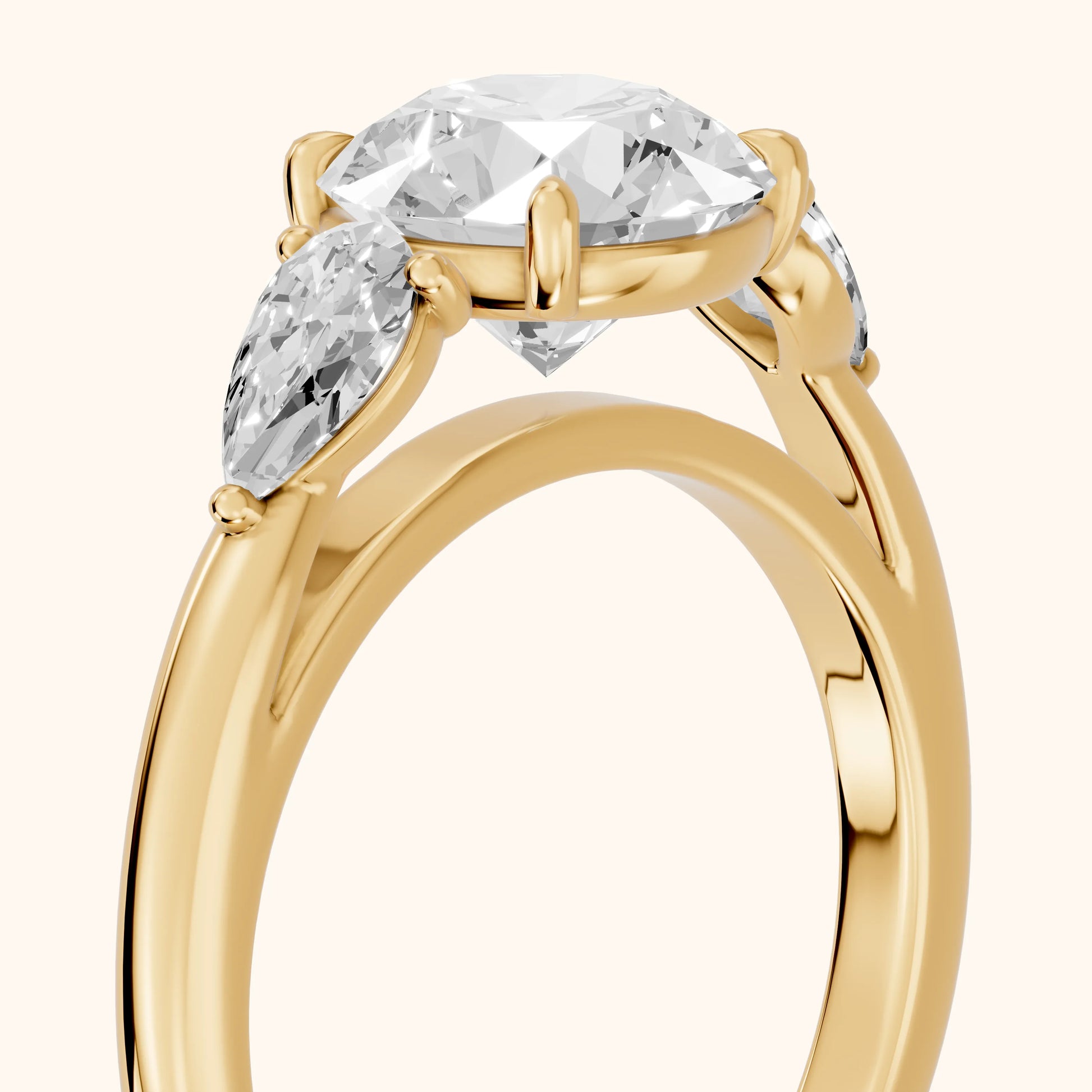 Phoebe Three-Stone Round Diamond Ring in Yellow Gold - slant-view.webp