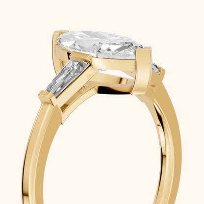 Winnie Three-Stone Marquise Diamond Engagement Ring in Yellow Gold - slant-view.webp