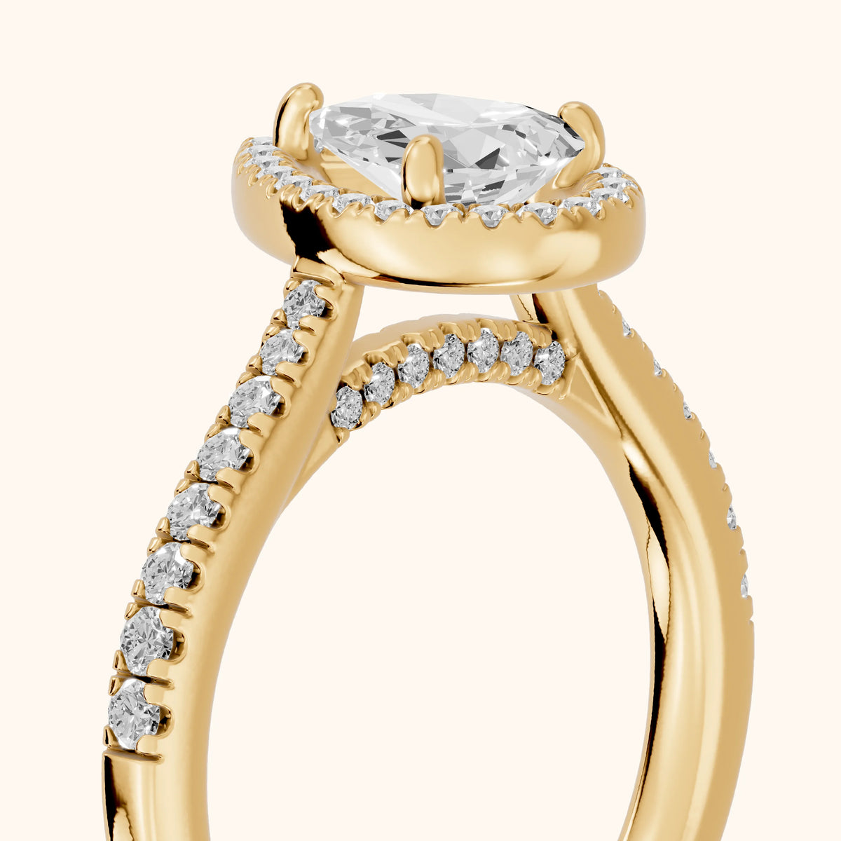 Pasco Halo Micropavé Pear Diamond Engagement Ring in Yellow Gold - slant-view.webp