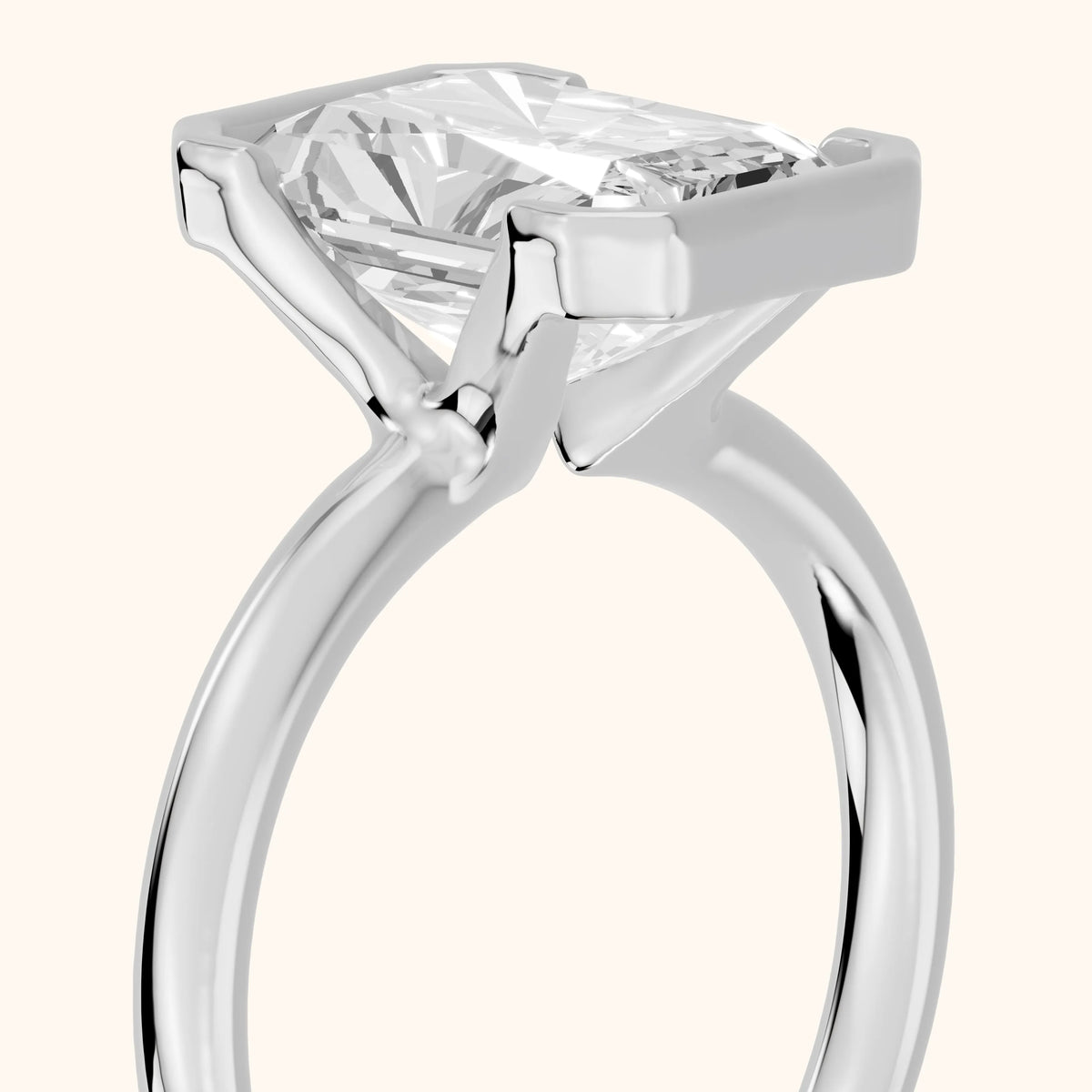Winslow Partial Bezel Solitaire Radiant Diamond Engagement Ring in Platinum - slant-view.webp