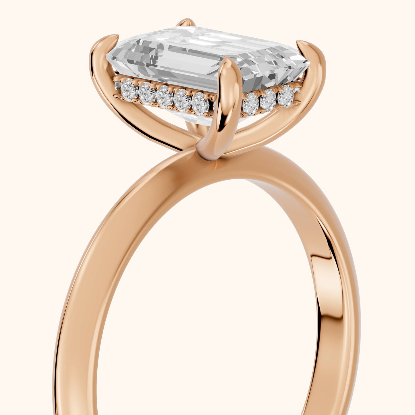 Amaya Hidden Halo Emerald Diamond Engagement Ring in Rose Gold - slant-view.webp
