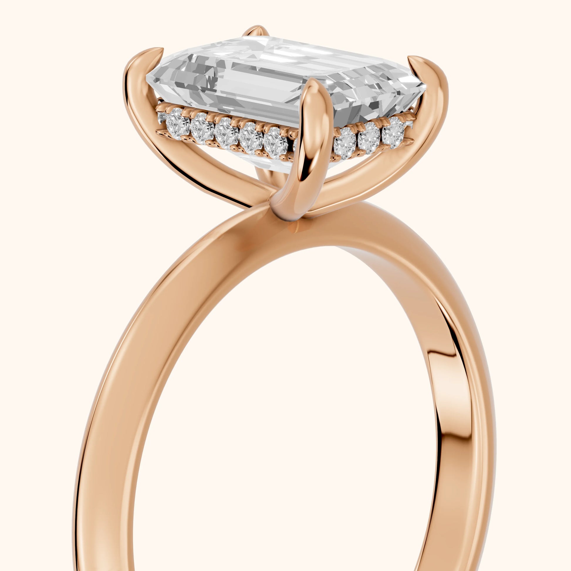 Amaya Hidden Halo Emerald Diamond Engagement Ring in Rose Gold - slant-view.webp