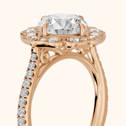 Caitlin Floral Halo Round Diamond Engagement Ring in Rose Gold - slant-view.webp