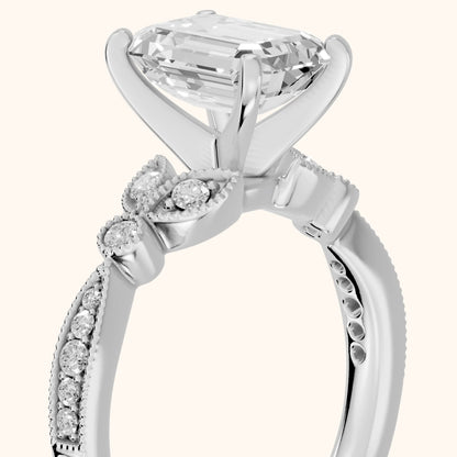 Ninette Vintage Leaf Emerald Diamond Engagement Ring in Platinum - slant-view.webp