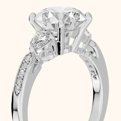Mariana Pear-Side Three-Stone Round Diamond Engagement Ring in Silver - slant-view.webp