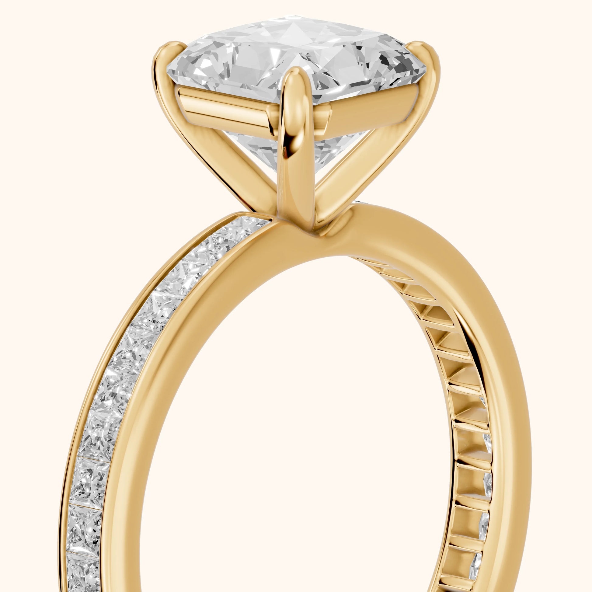 Brielle Channel Set Solitaire Radiant Diamond Ring in Yellow Gold - slant-view.webp