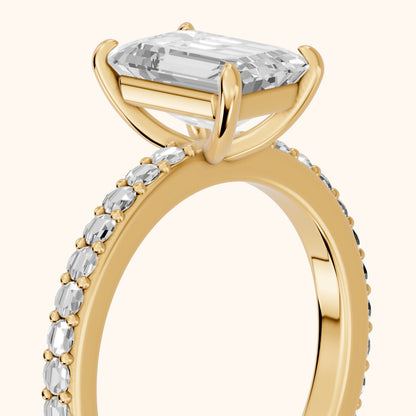 Aisha Pavé Solitaire Emerald Diamond Engagement Ring in Yellow Gold - slant-view.webp