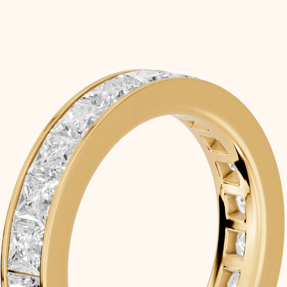 Louise Channel Set Princess Diamond Eternity Band in Yellow Gold - slant-view