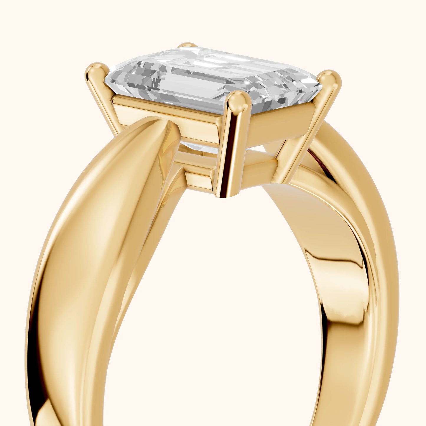 Talia Solitaire Twist Emerald Diamond Engagement Ring in Yellow Gold - slant-view.webp