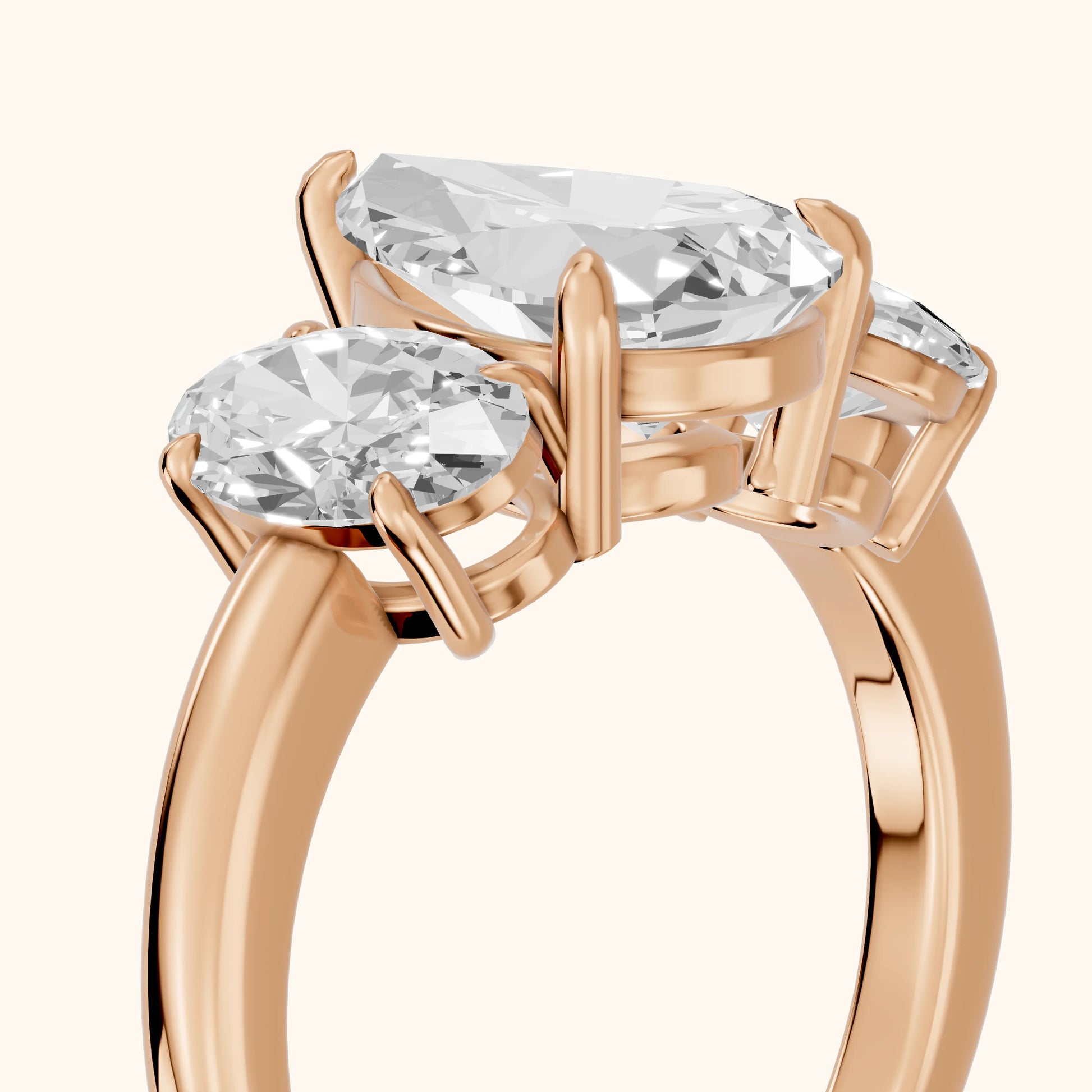 Lila Three-Stone Pear Diamond Ring in Rose Gold - slant-view.webp