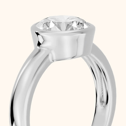 Cleo Bezel Solitaire Round Diamond Engagement Ring in Silver - slant-view.webp