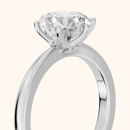Ada Tapered Solitaire Round Diamond Engagement Ring in Platinum - slant-view.webp