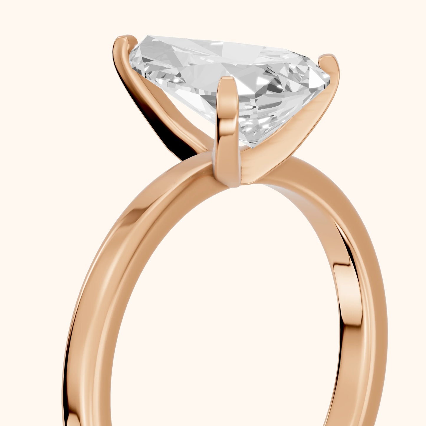 Liana Solitaire Claw Prong Pear Diamond Engagement Ring in Rose Gold - slant-view.webp