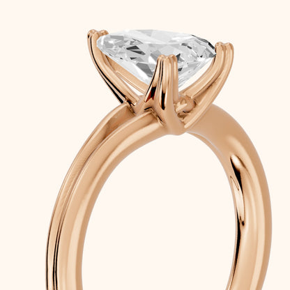Neve Solitaire Split Shank Pear Diamond Engagement Ring in Rose Gold - slant-view.webp