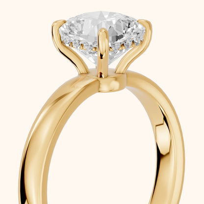 Lara Hidden Halo Cushion Diamond Engagement Ring in Yellow Gold - slant-view.webp