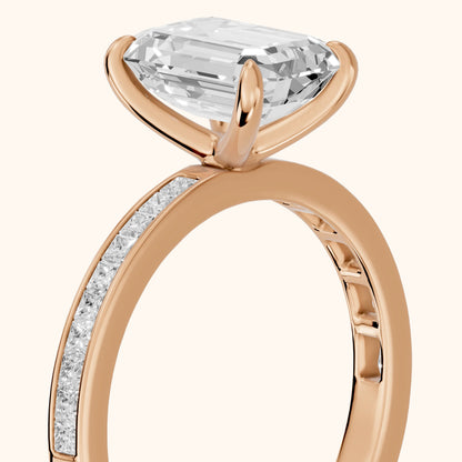 Freja Channel Set Emerald Diamond Engagement Ring in Rose Gold - slant-view.webp