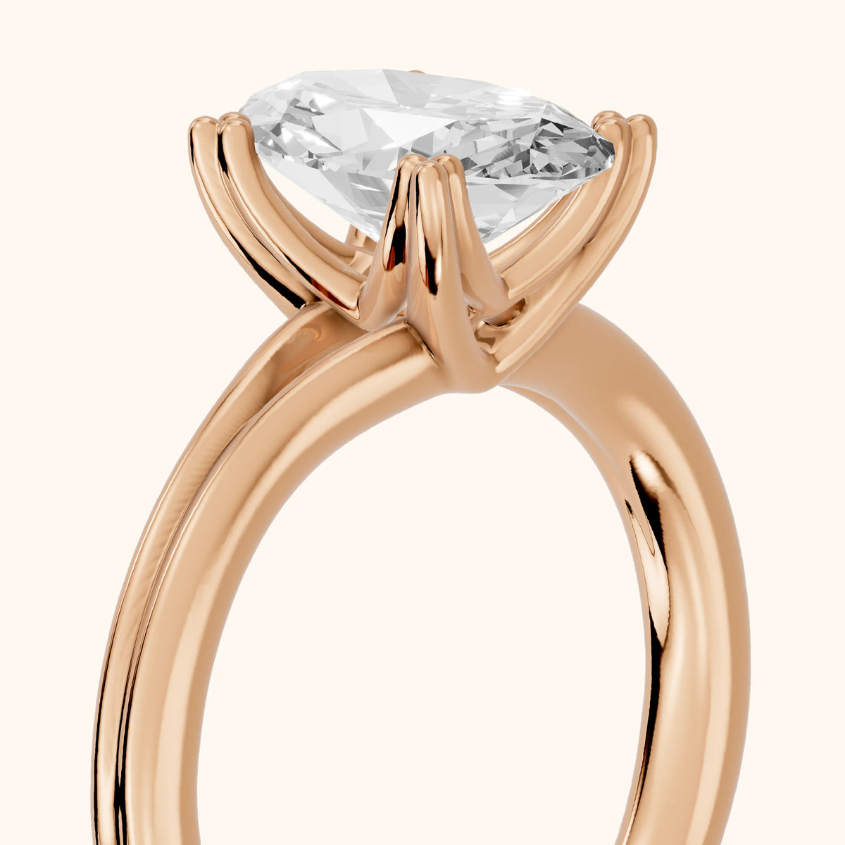 Neve Solitaire Split Shank Oval Diamond Engagement Ring in Rose Gold - slant-view.webp