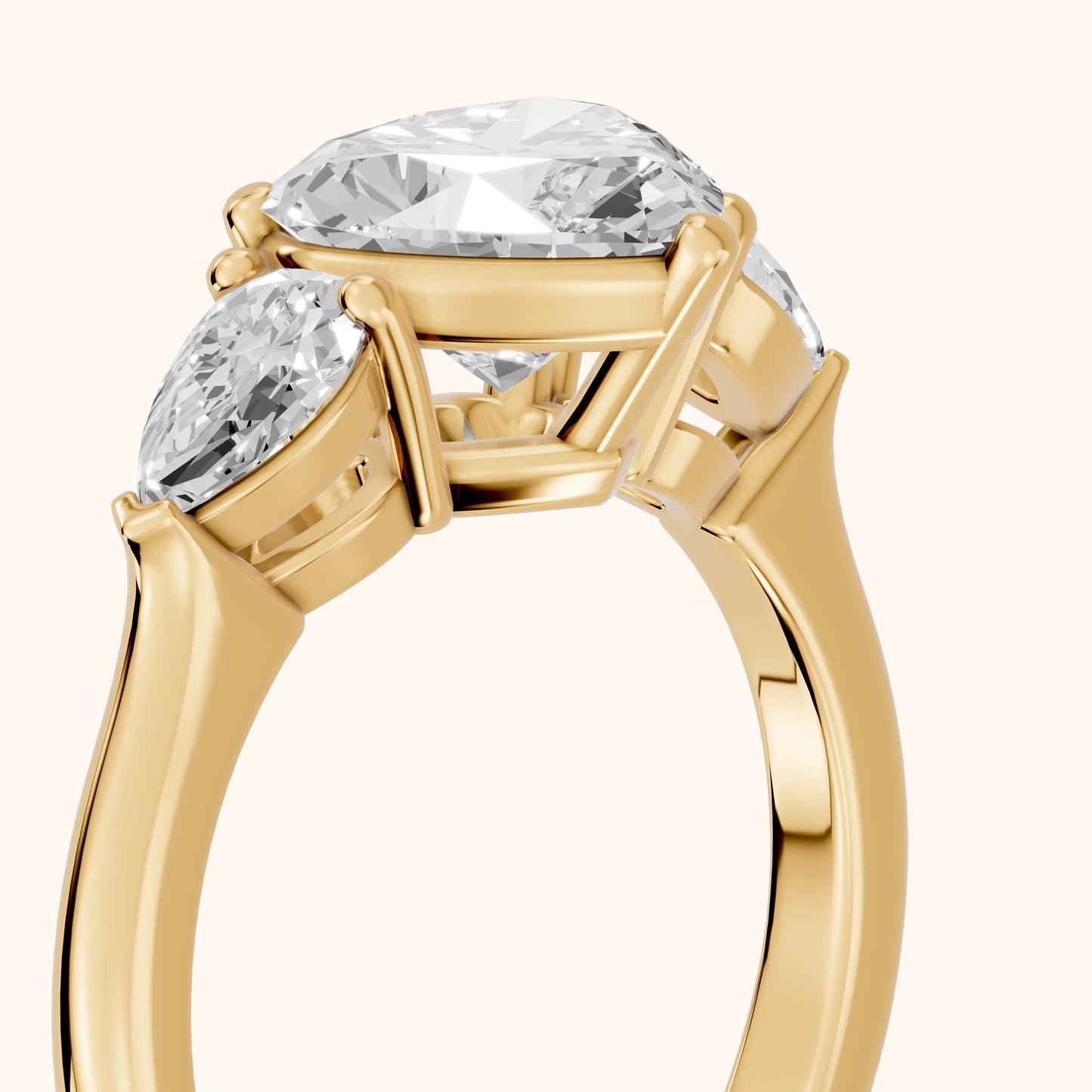 Mirabel Three-Stone Heart Diamond Engagement Ring in Yellow Gold - slant-view.webp
