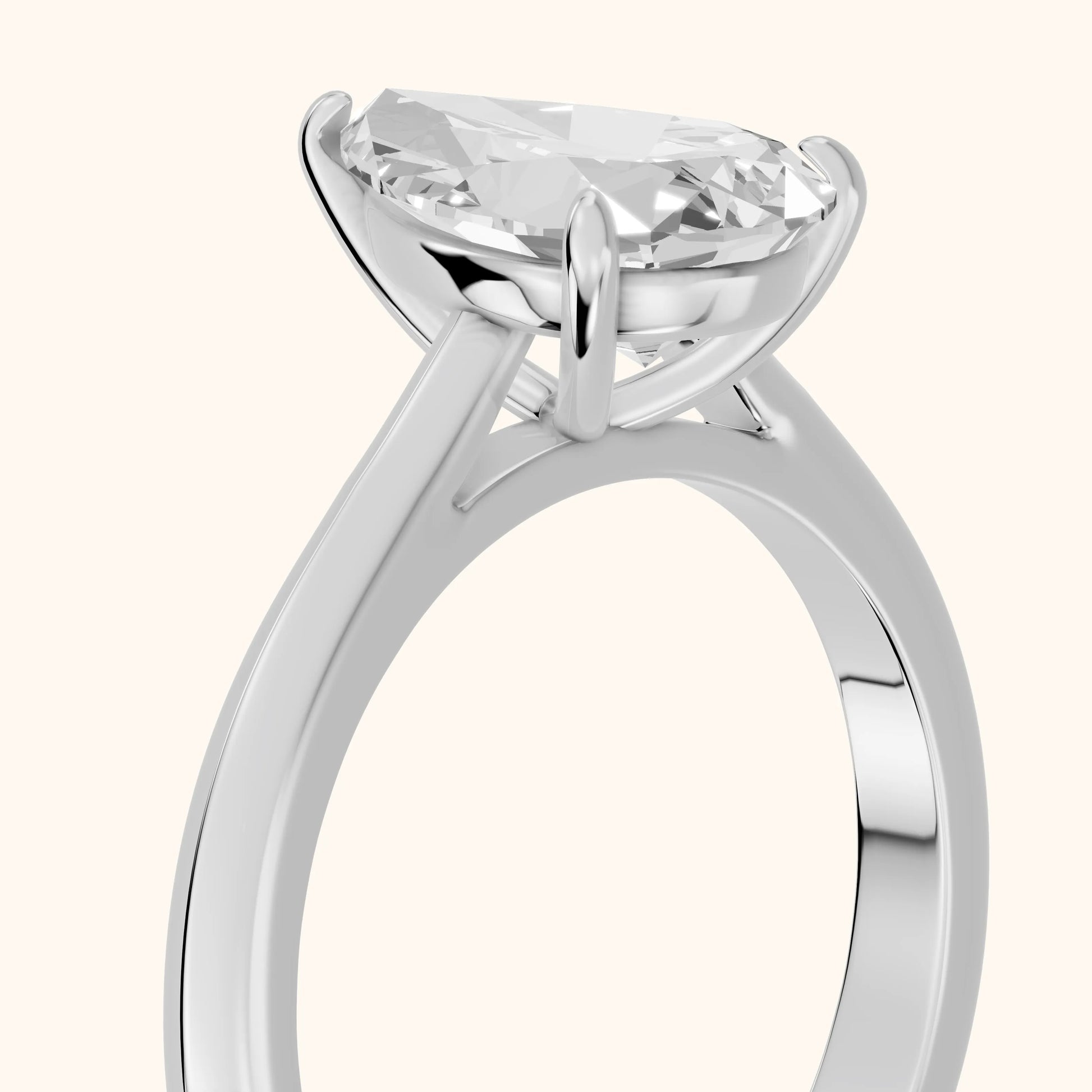Kalia Knife Edge Solitaire Pear Diamond Engagement Ring in Platinum - slant-view.webp