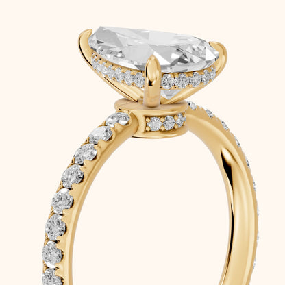 Thea Hidden Halo Pavé Pear Diamond Engagement Ring in Yellow Gold - slant-view.webp
