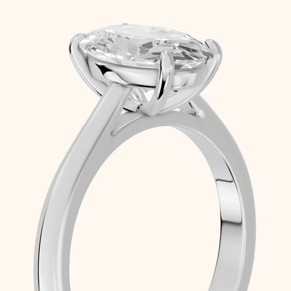 Kalia Knife Edge Solitaire Oval Diamond Engagement Ring in Platinum - slant-view.webp