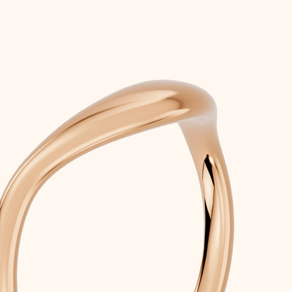Kavya Curved Contour Wedding Band in Rose Gold - slant-view