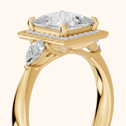 Eliza Halo Sidestone Princess Diamond Engagement Ring in Yellow Gold - slant-view.webp